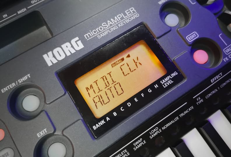 The device GLOBAL page showing MIDI CLK set to AUTO